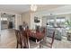 Dining area with a wood table, chairs, and decorative lighting at 549 E Balao Dr, Phoenix, AZ 85085