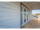 Cozy balcony featuring french doors providing ample sunlight at 6216 W Poinsettia Dr, Glendale, AZ 85304