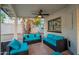 Relax on this covered patio with outdoor seating, offering a comfortable space for gatherings and leisure at 6216 W Poinsettia Dr, Glendale, AZ 85304