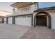 Exterior view featuring dark trim, garage, front-entry access and dark trim at 6216 W Poinsettia Dr, Glendale, AZ 85304