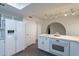 Bright kitchen featuring quartz countertops, stainless appliances, and lots of cabinet space at 6216 W Poinsettia Dr, Glendale, AZ 85304