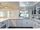 Bright kitchen featuring quartz countertops, stainless appliances, and lots of natural light at 6216 W Poinsettia Dr, Glendale, AZ 85304