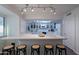 Bright kitchen with quartz countertops, breakfast bar, and modern appliances at 6216 W Poinsettia Dr, Glendale, AZ 85304