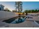 Sparkling pool and spa offering a refreshing oasis with a spacious patio area for lounging at 6216 W Poinsettia Dr, Glendale, AZ 85304