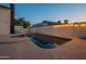 Backyard pool with a view to a patio area at 6216 W Poinsettia Dr, Glendale, AZ 85304