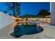 Inviting backyard pool with ladder and patio, ideal for relaxation and recreation at 6216 W Poinsettia Dr, Glendale, AZ 85304