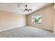 Spacious bedroom with vaulted ceilings, soft carpet, and natural light from the window at 720 W Palo Verde St, Gilbert, AZ 85233