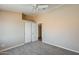 Spacious bedroom with neutral walls, plush carpet, and ample closet space at 720 W Palo Verde St, Gilbert, AZ 85233