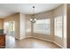 Inviting dining area featuring natural light from large windows and a sliding glass door at 720 W Palo Verde St, Gilbert, AZ 85233