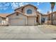 Beautiful two-story home with a three car garage and tile roof at 720 W Palo Verde St, Gilbert, AZ 85233