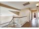 Bright hallway with stairs, tile flooring, and a high ceiling, providing a spacious feel at 720 W Palo Verde St, Gilbert, AZ 85233