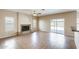 Spacious living room featuring tile flooring, a ceiling fan and fireplace at 720 W Palo Verde St, Gilbert, AZ 85233