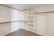 Spacious walk-in closet with built-in shelving and ample storage space at 720 W Palo Verde St, Gilbert, AZ 85233