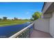 Inviting balcony with a view of the lake and lush golf course, perfect for relaxation at 7272 E Gainey Ranch Rd # 23, Scottsdale, AZ 85258