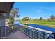 Scenic balcony view overlooking the lake and golf course, providing a peaceful retreat at 7272 E Gainey Ranch Rd # 23, Scottsdale, AZ 85258
