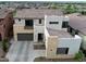 Aerial view of modern home with tiled roof in planned community at 826 E Buist Ave, Phoenix, AZ 85042