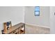 Hallway with a small table and wall decor at 826 E Buist Ave, Phoenix, AZ 85042