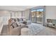 Upstairs loft featuring a comfortable sectional sofa and a view of the mountains at 826 E Buist Ave, Phoenix, AZ 85042