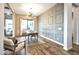 Well-lit home office featuring stylish wall accents and hardwood floors at 826 E Buist Ave, Phoenix, AZ 85042
