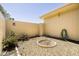 Private backyard features a rockscape and well-maintained planting beds at 10468 W Palmeras Dr, Sun City, AZ 85373