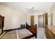 View of a bedroom with neutral walls and carpeted flooring with two closets at 10468 W Palmeras Dr, Sun City, AZ 85373