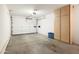 Spacious garage offering ample storage and parking, featuring a large storage cabinet at 10468 W Palmeras Dr, Sun City, AZ 85373
