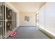 Enclosed patio with security screen and privacy shades creating a comfortable space at 10468 W Palmeras Dr, Sun City, AZ 85373