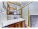 Bathroom vanity with a framed mirror, good lighting, white counter top, and a glass framed shower at 111 S Greenfield Rd # 547, Mesa, AZ 85206