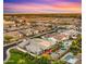 Beautiful aerial shot of a Gathering neighborhood featuring backyard pools and well-manicured lawns at 13820 W Weaver Ct, Litchfield Park, AZ 85340