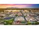 Luxury community with mature landscaping, private pools, and outdoor seating areas, aerial view at 13820 W Weaver Ct, Litchfield Park, AZ 85340