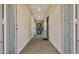 Inviting entryway with brick floors and decorative front door at 13820 W Weaver Ct, Litchfield Park, AZ 85340