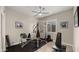 Home gym features weight training equipment and rubber flooring at 13820 W Weaver Ct, Litchfield Park, AZ 85340