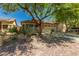 Charming single-Gathering home with lush landscaping, two-car garage, and inviting curb appeal at 15460 W Mescal W St, Surprise, AZ 85379