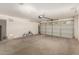 Spacious garage with ample room for vehicle storage and projects at 15460 W Mescal W St, Surprise, AZ 85379