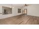 This home's spacious floor plan features durable flooring, fresh paint, and large windows to maximize natural light at 15460 W Mescal W St, Surprise, AZ 85379