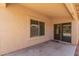 Covered patio with serene views of the backyard and desert landscaping at 15460 W Mescal W St, Surprise, AZ 85379