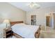 Comfortable bedroom features neutral walls, soft carpet and a walk-in closet at 15960 W Indigo Ln, Surprise, AZ 85374