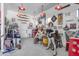 Eclectic garage with automobile and motorcycle memorabilia, mannequins, and vintage signage at 16645 W Papago St, Goodyear, AZ 85338
