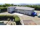 Aerial view of home with a large garage and well-maintained backyard area at 16645 W Papago St, Goodyear, AZ 85338