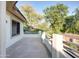 Balcony with beautiful street and landscape views, plus white columns and railing at 1707 E Carob Dr, Chandler, AZ 85286