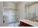 Bathroom featuring glass enclosed shower, toilet, and vanity at 1707 E Carob Dr, Chandler, AZ 85286