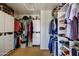 Spacious closet with ample space for clothing and shoes, offering optimal storage and organization options at 1707 E Carob Dr, Chandler, AZ 85286