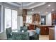 Charming dining area features a windowed breakfast nook and granite countertops at 1707 E Carob Dr, Chandler, AZ 85286