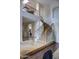 Elegant foyer showcasing a curved staircase with wood and wrought iron railing at 1707 E Carob Dr, Chandler, AZ 85286