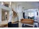 Grand foyer with spiral staircase and open floor plan into the living room at 1707 E Carob Dr, Chandler, AZ 85286