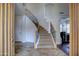 Inviting foyer with a view of the grand staircase and dining room at 1707 E Carob Dr, Chandler, AZ 85286