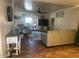 Relaxing living room with archway, neutral colors, ceiling fan and tile flooring throughout at 1841 S Spruce --, Mesa, AZ 85210