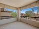 Spacious covered balcony offering ample room with black metal railings and a neighborhood view at 20121 N 76Th St # 2058, Scottsdale, AZ 85255