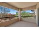 Spacious balcony showcasing exterior view and string lights at 20121 N 76Th St # 2058, Scottsdale, AZ 85255