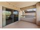 Cozy outdoor balcony featuring string lights and sliding glass doors to blend indoor/outdoor living at 20121 N 76Th St # 2058, Scottsdale, AZ 85255